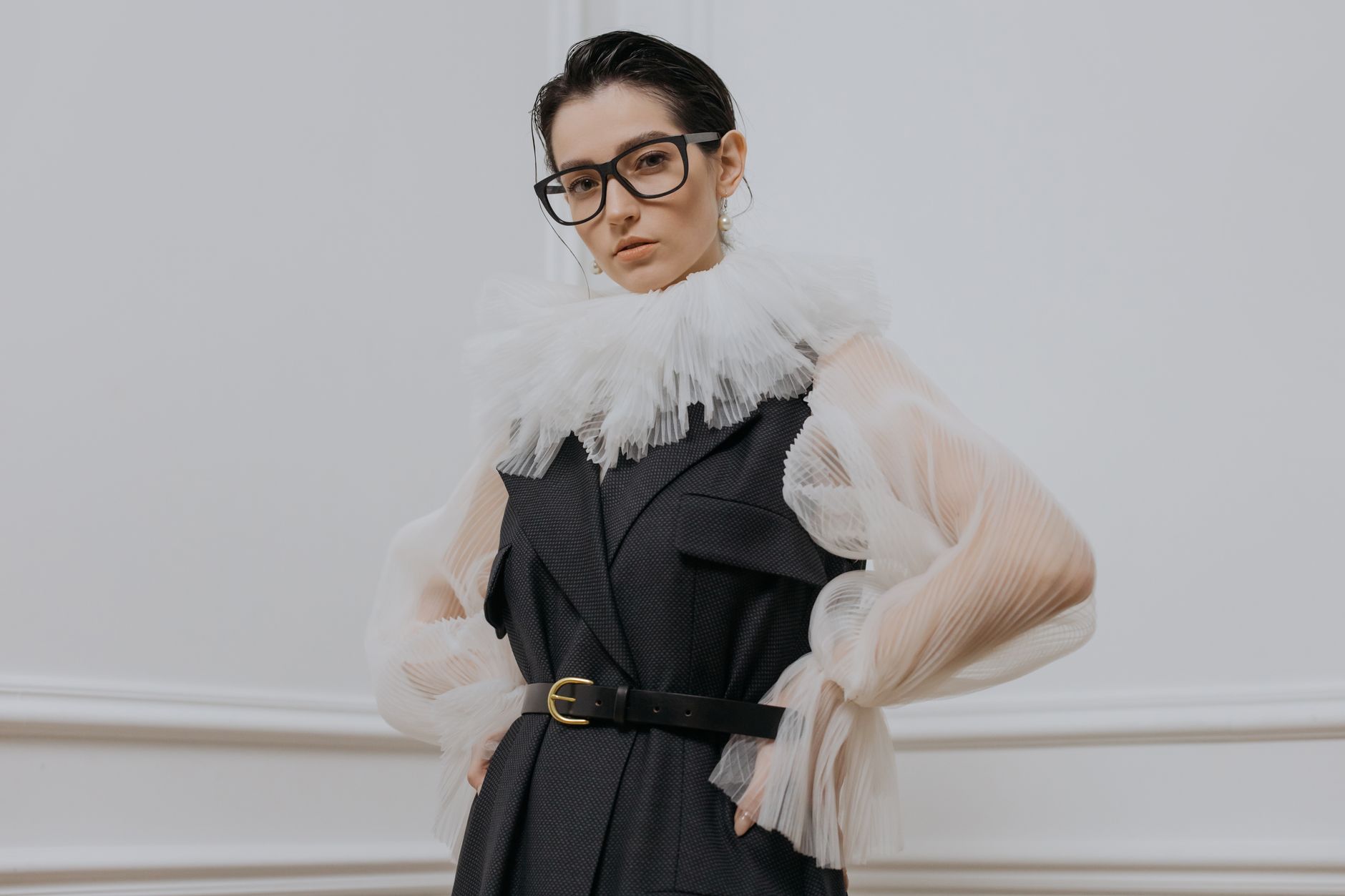 A fashion executive reviewing a printed event schedule at a climate-focused conference in New York