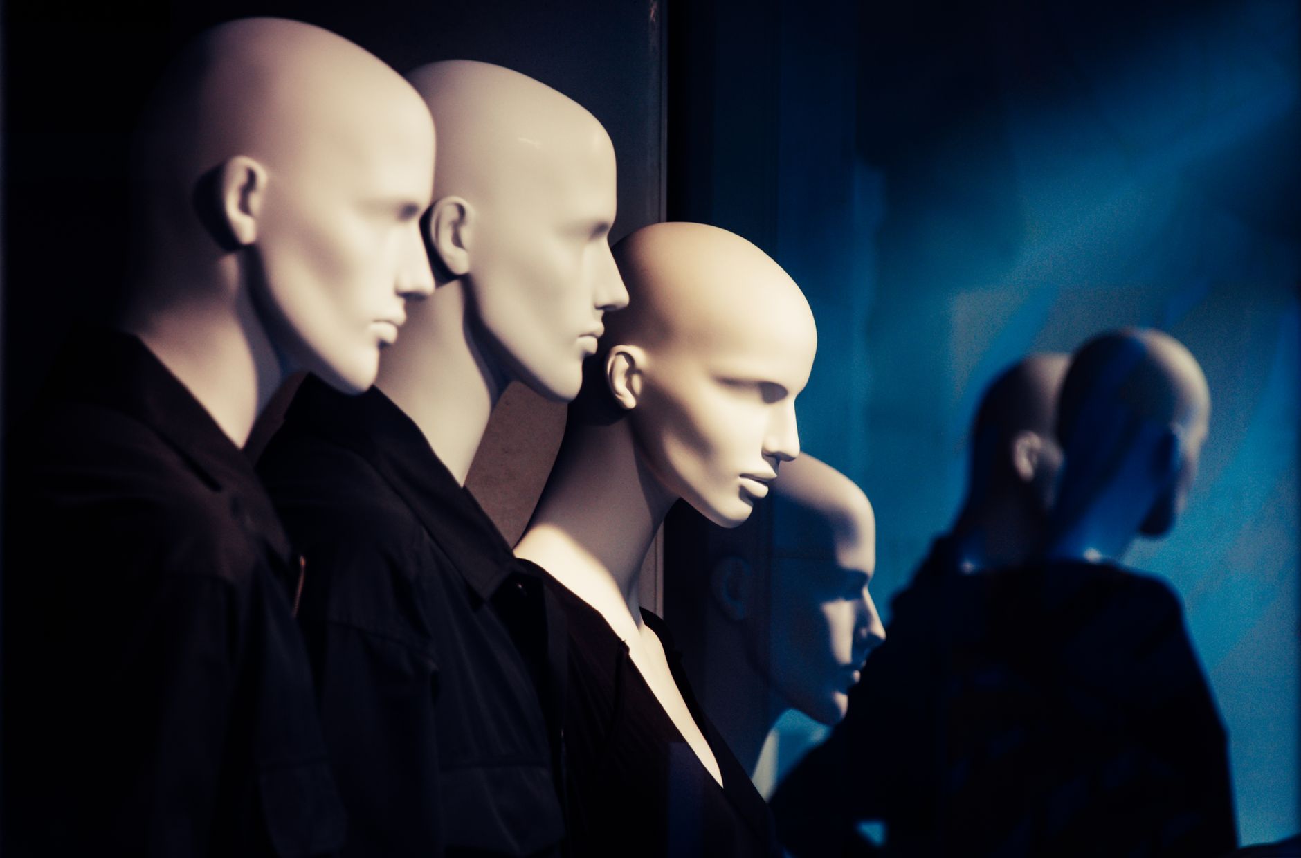 Fashion designers discussing sustainable fabric options